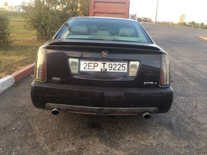 Кадиллак sts